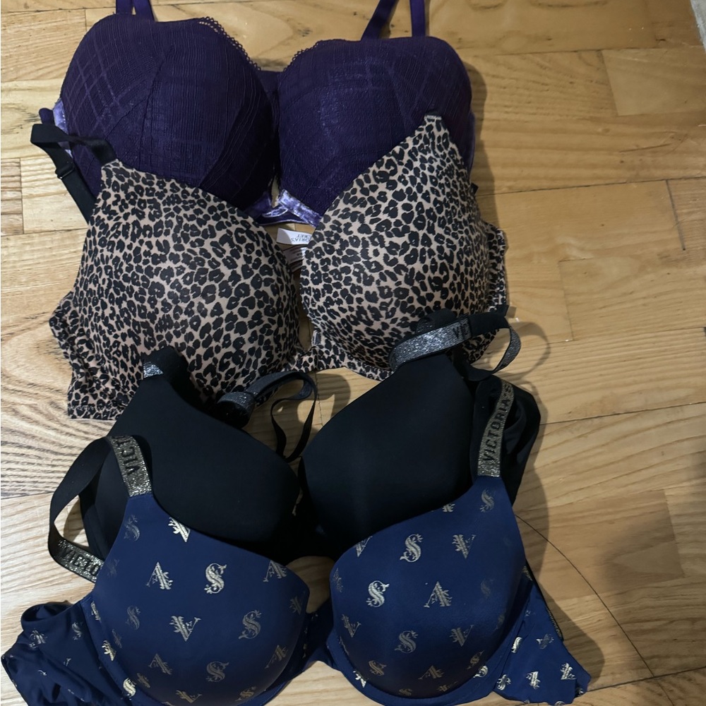 VS Bras. Black 34C, Navy  34C.  Leopard print 36D, Purple 36D. $25.00 each